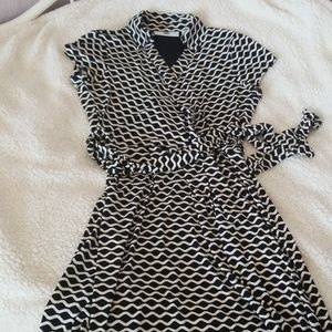 Three women's dresses. Great condition.